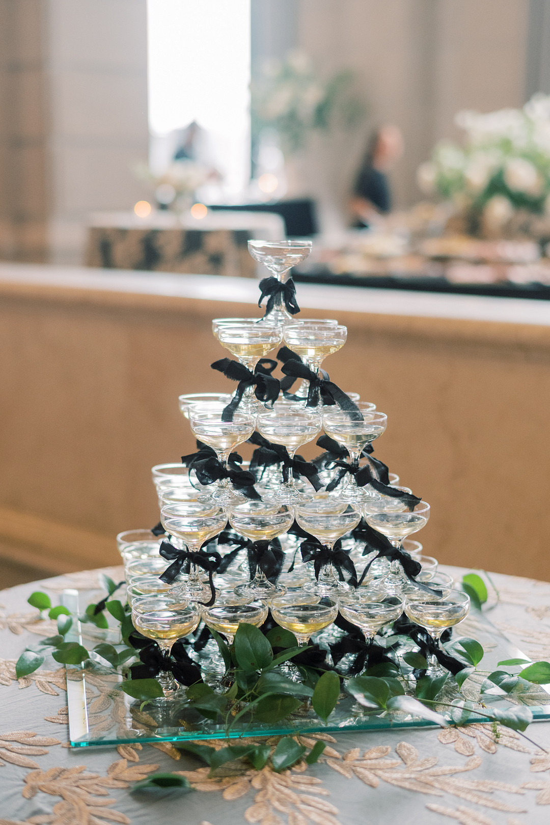 Champagne tower on a table at the reception