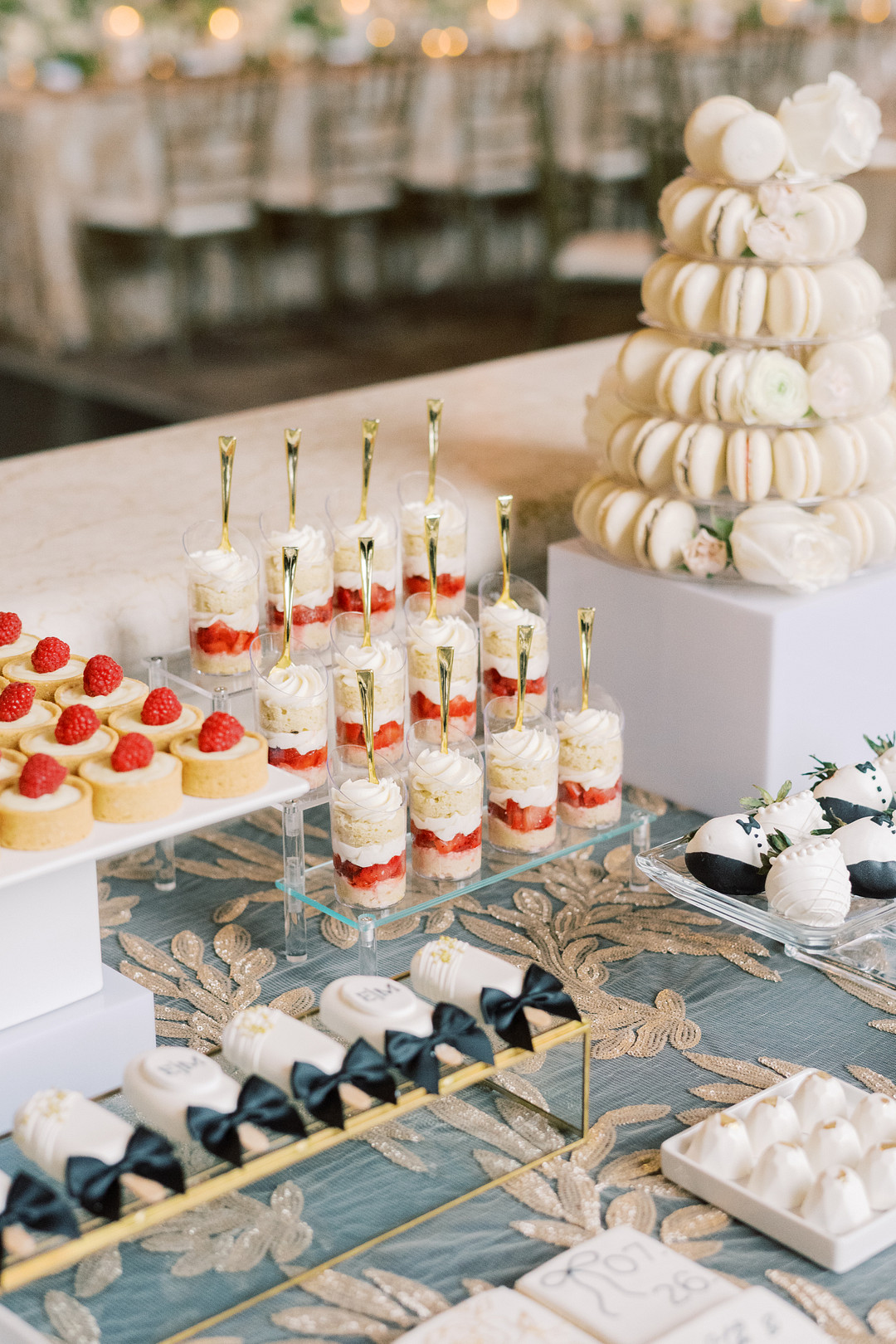 Dessert table with macarons and small desserts