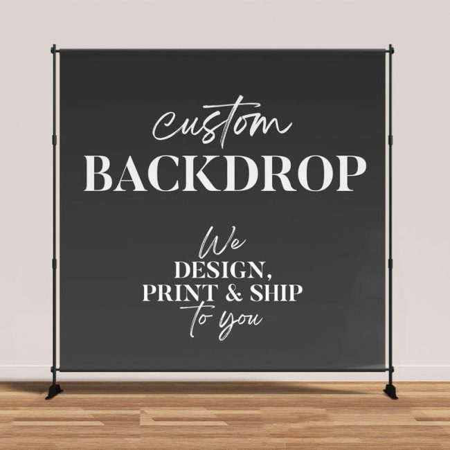 BaloeDesigns black backdrop banner on a metal stand reading Custom Backdrop