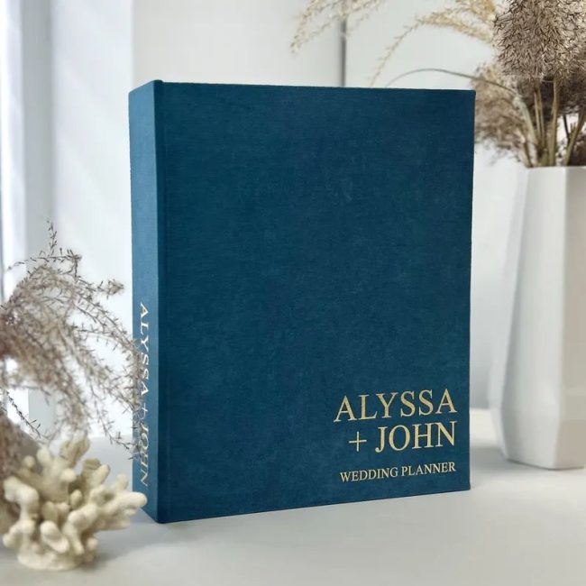 CatchThisMoment navy linen wedding planner binder with names in gold