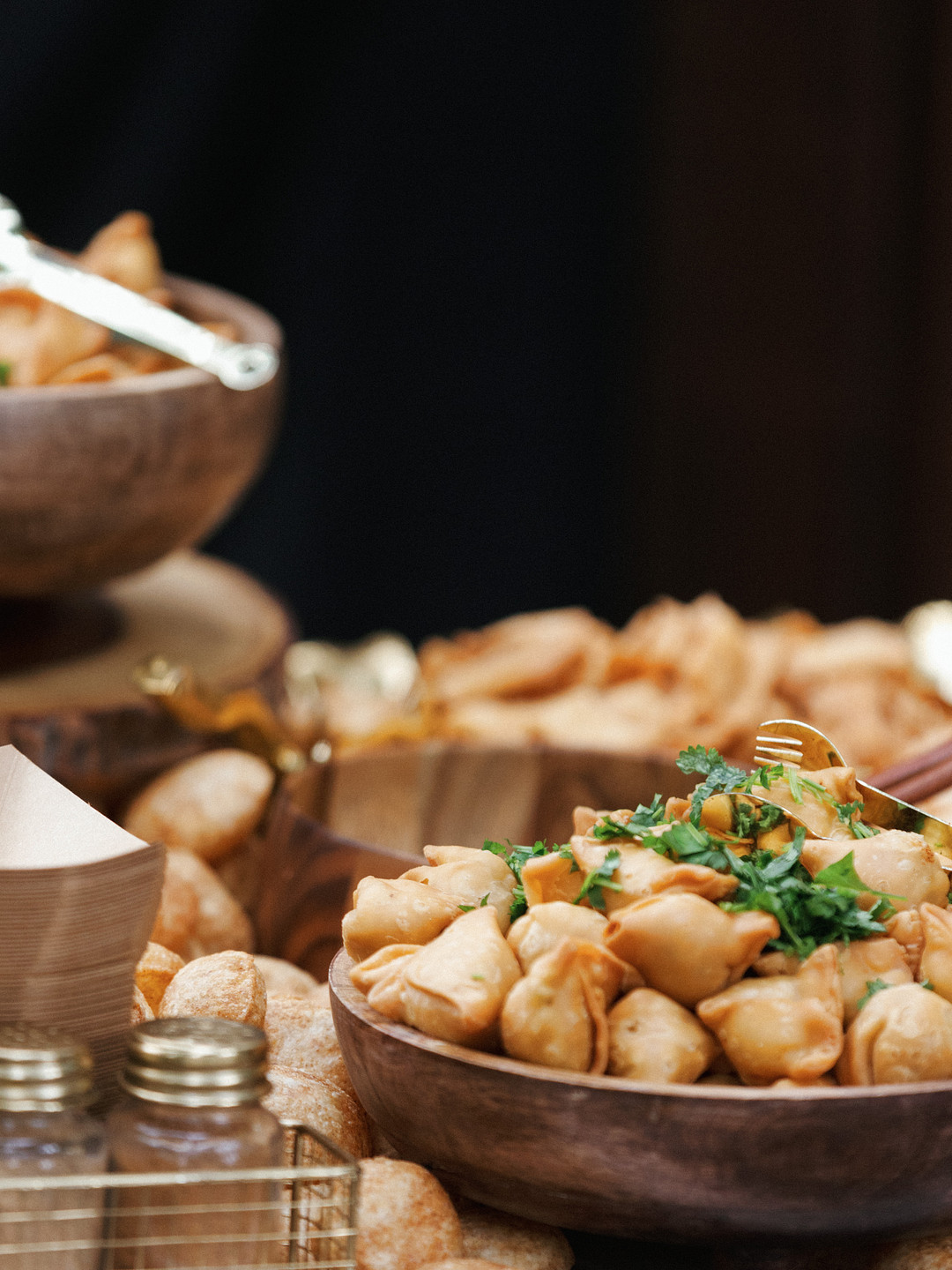 Bowls of savory snacks on the buffet