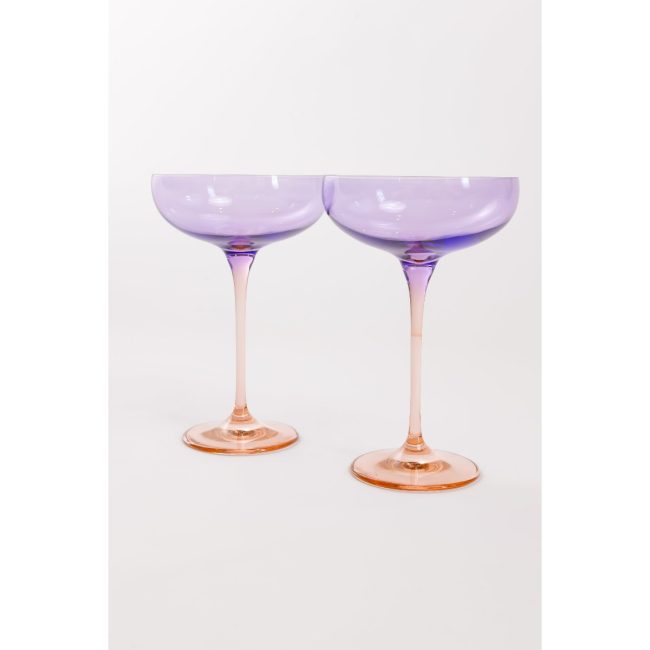 Two Estelle Colored Glass champagne coupes in lavender and blush pink