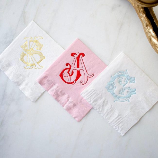 GBDesignHouse white and pink cocktail napkins foil-stamped with gold, red and blue monograms