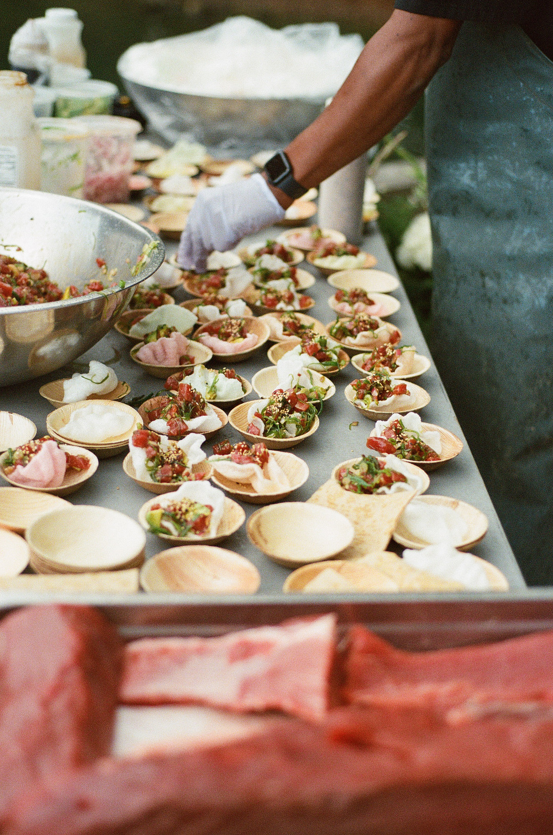 Plates of fresh tuna being served at cocktail hour
