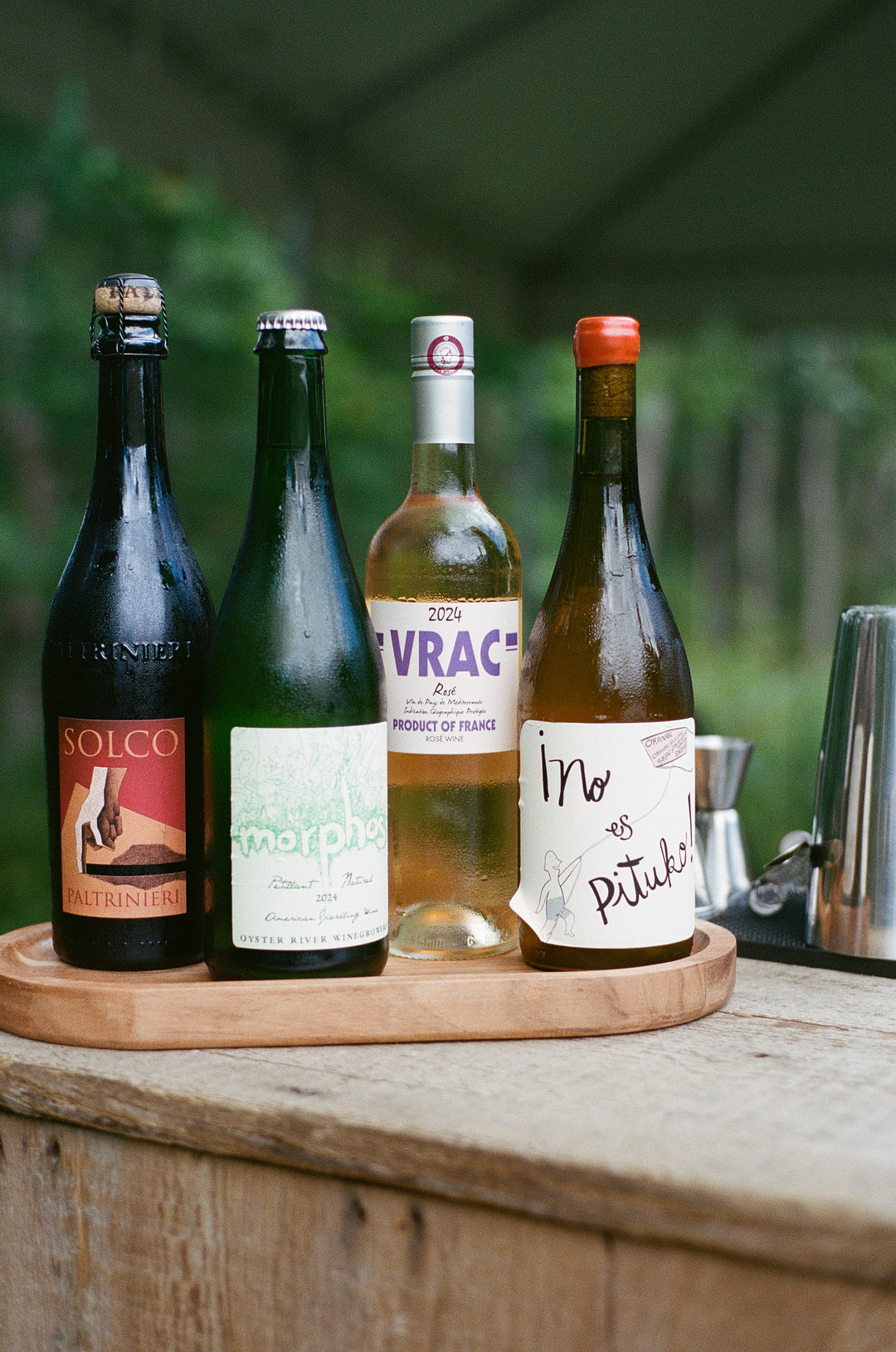 Wine bottles lined up on the bar