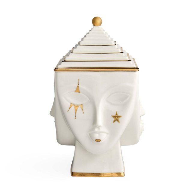 Jonathan Adler Masquerade ice bucket, a white porcelain head with gold symbols and a gold-trimmed lid