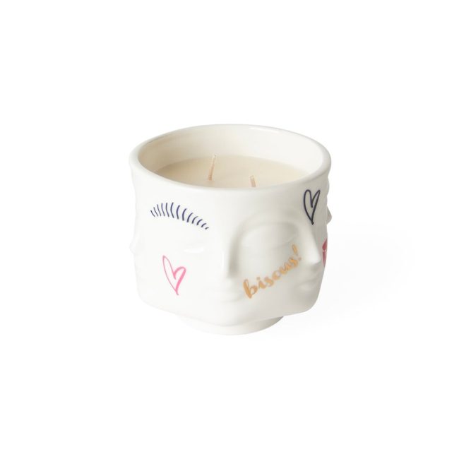 Jonathan Adler Muse L'Amour candle in a white porcelain pot sculpted with a face and pink lips