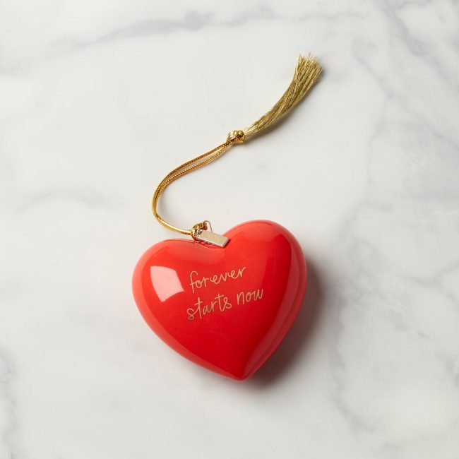 kate spade new york red heart ornament with forever starts now in gold script and a gold tassel hanger