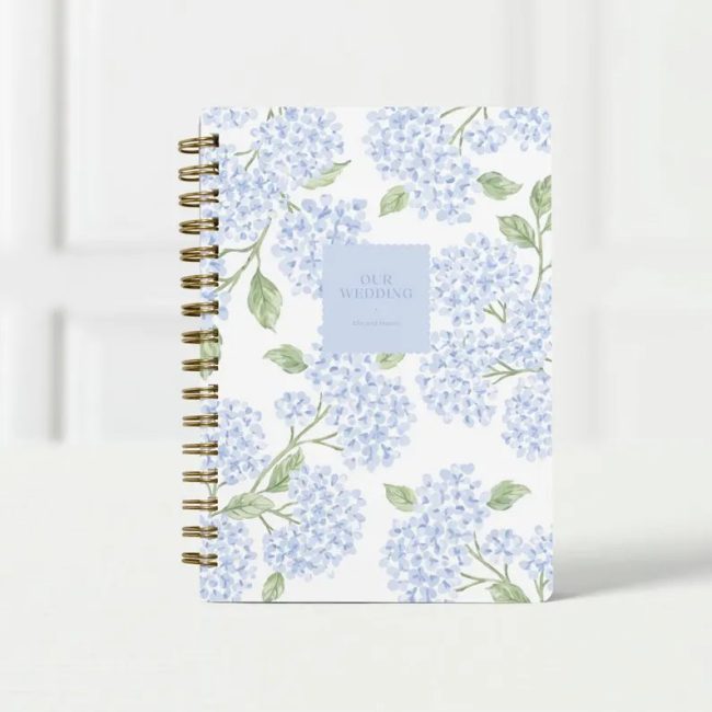 KeepsakePaper spiral wedding planner with a blue hydrangea cover