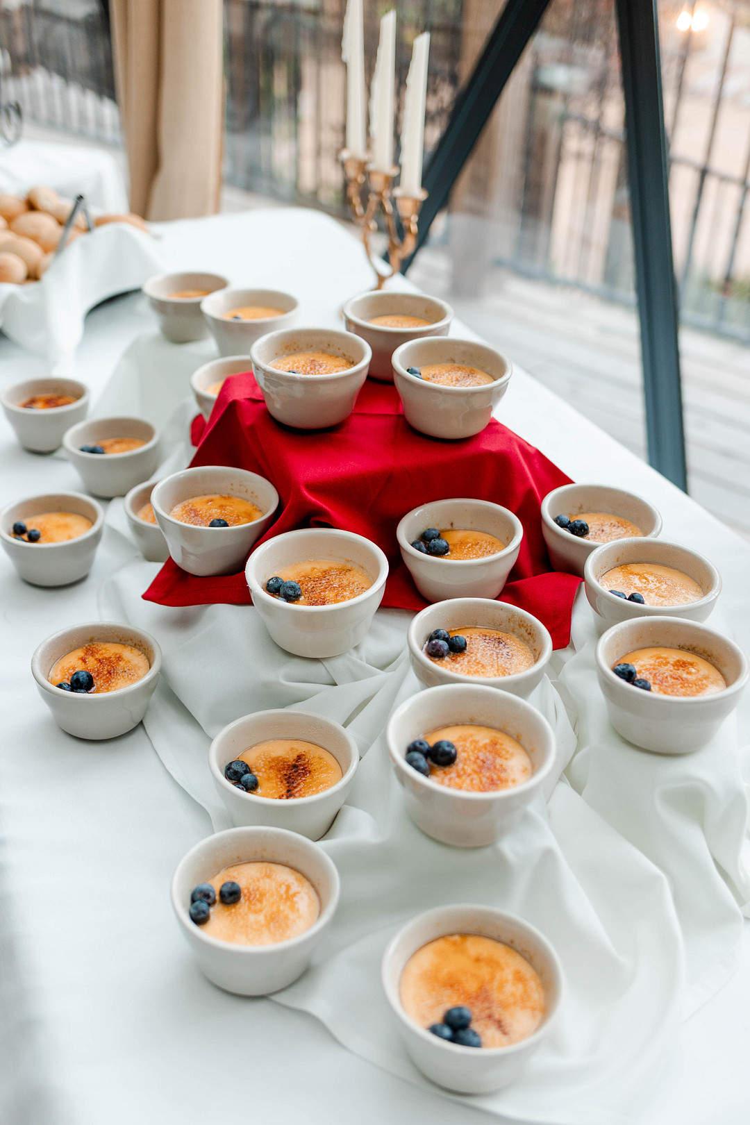 Dessert cups lined up on the dessert table